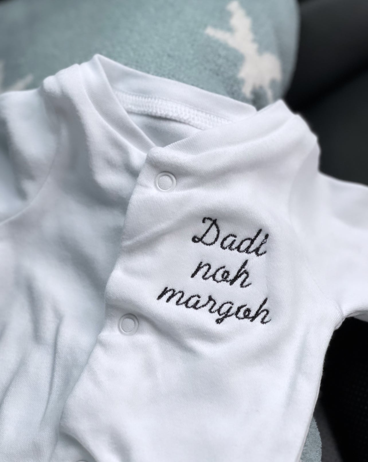 Embroidered baby grow